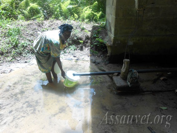 Amenagement d’une source et  construction d’un puits a Dibang